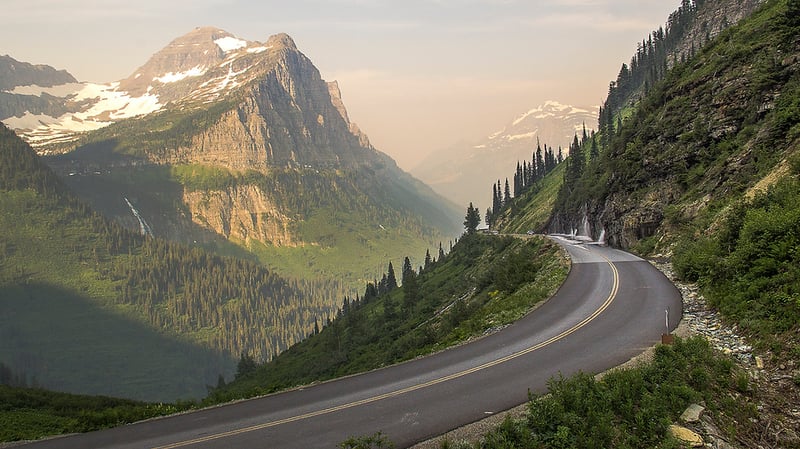 A road in a journey through mountains